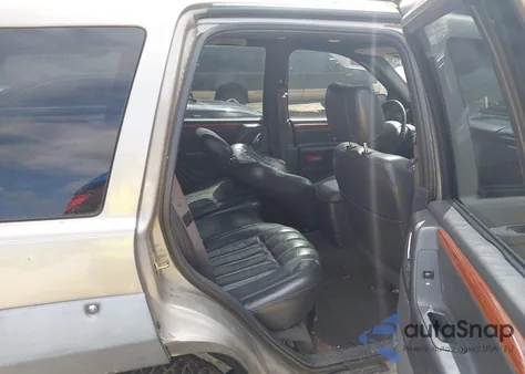 1999 Jeep Grand Cherokee Limited z USA, uszkodzony, nr VIN 1J4GW68N6XC808744